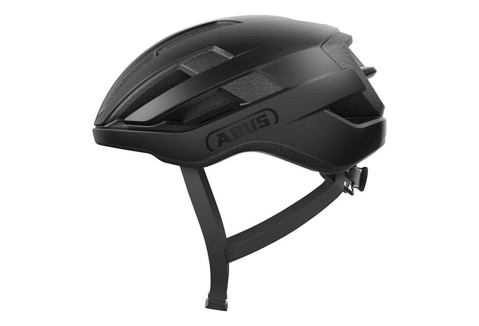 ABUS WingBack cykelhjelm i farven Velvet black – minimalistisk og sporty hjelm med slankt vingedesign, dybe ventilationskanaler og aerodynamisk afrivningskant.
